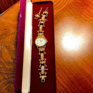 Premier design crystal gold watch with extension.